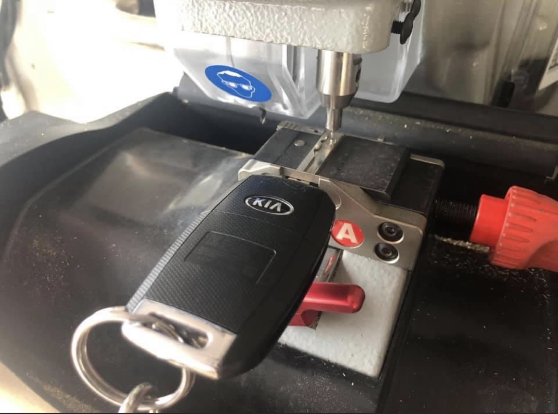 Automotive key programming equipment in use