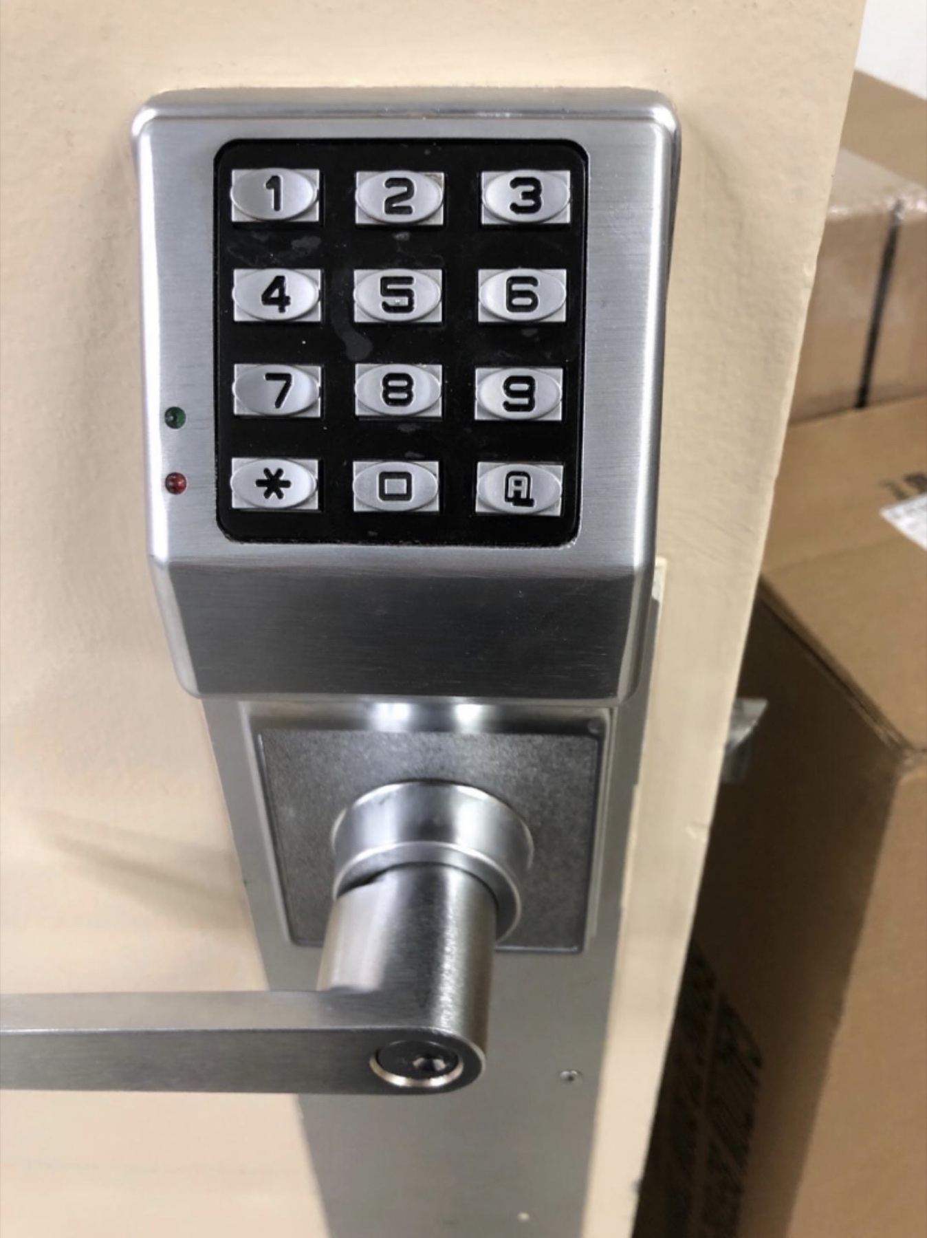 Keypad security lock installed on a commercial door